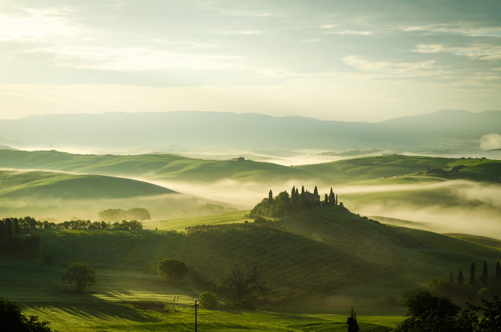 Landscape image across the Tuscan hills shot with different metering modes